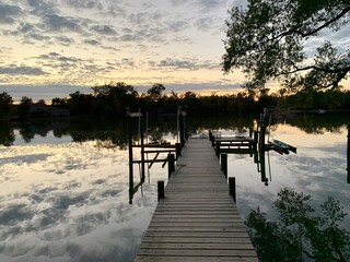 sunset on bay with dock, maryland