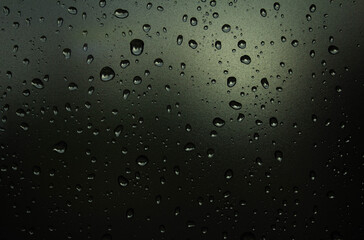 Raindrops on the glass. Raindrops on a sky background. Background. Texture.