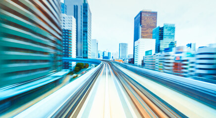 Abstract high speed technology POV train motion blurred concept from the Yuikamome monorail in Tokyo, Japan