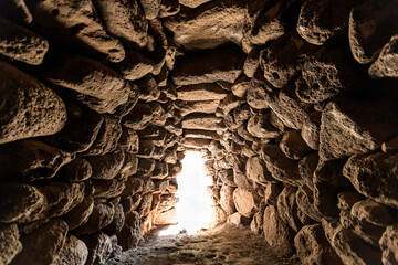 Interior of one Nuraghe in the ancient Nuragic village near Paulilatino, Oristano, Sardinia, Italy.