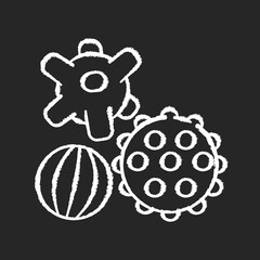 Sensory balls chalk white icon on black background. Tactile and spiky balls. Early childhood. Toys for infants development. Fine and gross motor skills. Isolated vector chalkboard illustration