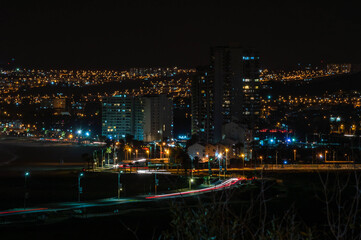 city ​​and its buildings under the lights that adorn the view