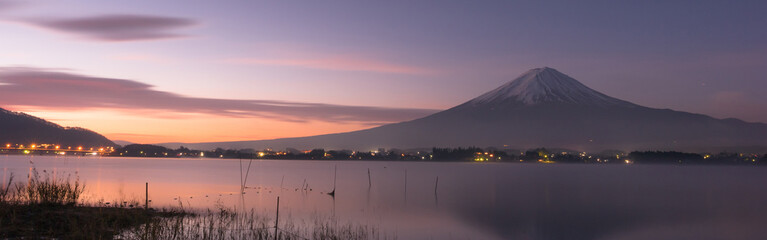 Fototapeta premium web banner night scape before sunrise from mountain fuji at kawaguchiko lake japan with soft focus foreground