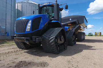 tracked tractor with rubber tires blue for industrial and agriculture transport use