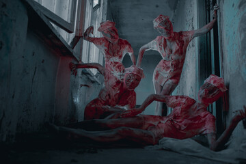 Cosplayers portray bloody monsters mannequins.