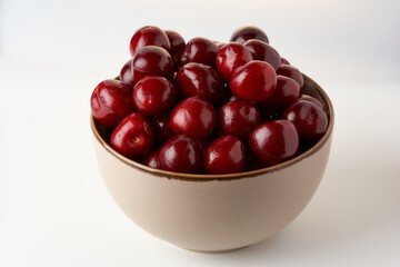 Ripe cherries in a bowl