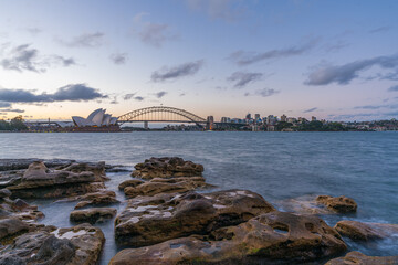 Sydney harbor skyline at sunset with Sydney harbor bridge, NSW, Australia