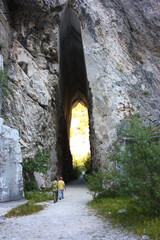 natural arched entrance of a former marble quarry