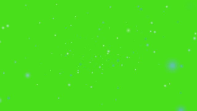 snow and ice dust falling slowly and faded on green screen