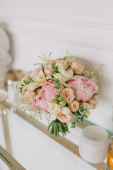 Gift bouquet for the holiday for the girl on a white wall