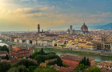 Fototapeta na wymiar Florence old city skyline at sunset with Ponte Vecchio over Arno River and Cathedral of Santa Maria del Fiore in Florence, Tuscany, Italy.