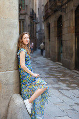 Beautiful girl on the street of an ancient city.