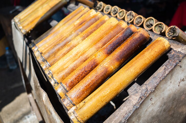 rice cooked in bamboo tubes