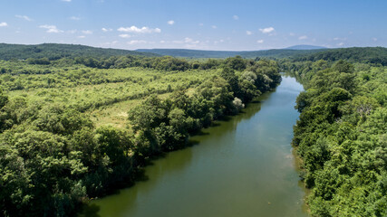 Fototapeta na wymiar Aerial view of river and beautiful forest. Veleka River in Bulgaria