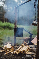 Cooked food on a campfire on a camping trip. camping kitchen, cooking in the forest on fire. A...