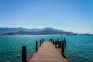 Pier in the sea of the Brazilian island