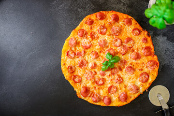 pizza salami sausages cheese classic recipe sauce fast food Takeaway Menu concept serving size. food background top view copy space for text organic healthy eating