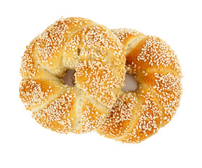 Two turkish bagels simits with sesame seeds isolated on white background.