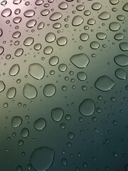 Water drops through the window after the rain.