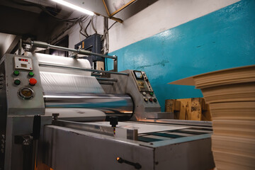 Industrial laminator, lamination of paper products. The manufacture of packaging. Outdated...