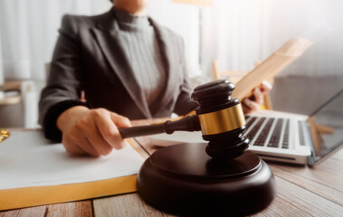 Business and lawyers discussing contract papers with brass scale on desk in office. Law, legal services, advice, justice and law concept picture with film grain effect