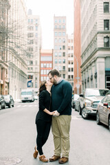 A young couple kissing on a NYC street