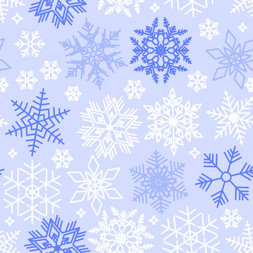 stylish gentle Christmas background with cute patterns of different white and purple snowflakes on violet
