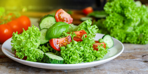 Healthy salad vegetables leaves mix micro greens, juicy snack, tomato. food background copy space for text organic healthy eating keto or paleo diet