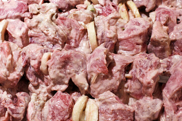 Pickled kebab. Fresh meat with onions. Food background