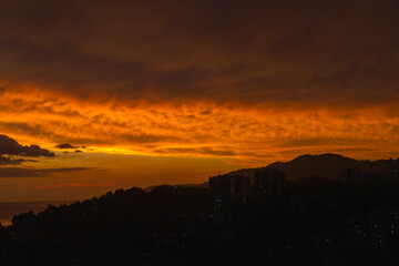 View on sunset from the window. Sochi, Russia.