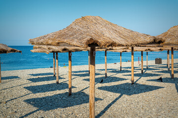 Umbrellas on the beach in Nebug, Russia