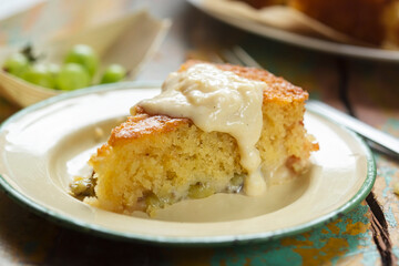 Sticky gooseberry saffron cake with vanilla custard
