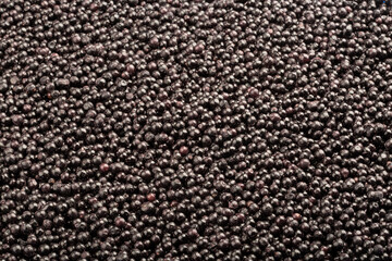 Frozen fresh elderberry. Food background. Top view