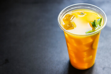 orange juice drink or lemonade mint transparent beverage glass cup takeaway drink Menu concept serving size food background top view copy space for text organic healthy eating