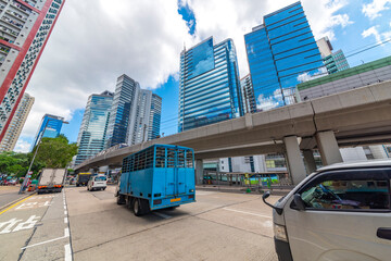 Obraz premium Tall buildings on the sky light rail and ground bus stops.
