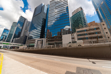 Fototapeta premium Tall buildings on the sky light rail and ground bus stops.