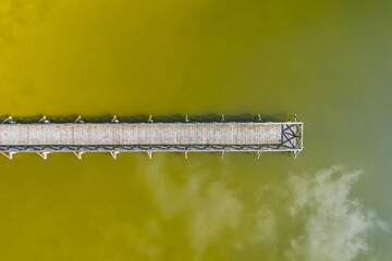Aerial view of a smal wooden dock on a lake