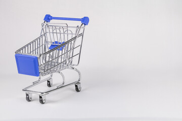 Shopping cart with blue elements on a white background.