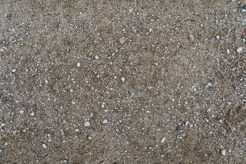 Texture of sand with pebbles