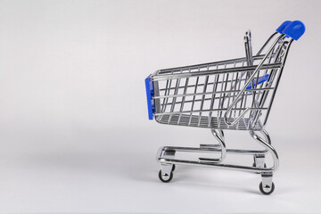 Shopping cart with blue elements on a white background.