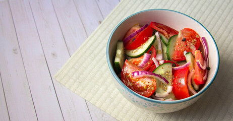 tomatoes and cucumbers salad with red onion