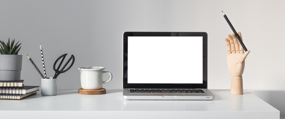Workspace with laptop screen, minimal workplace. Stylish home office.