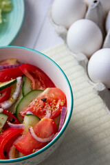 tomatoes and cucumbers salad with red onion
