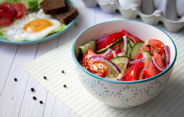 tomatoes and cucumbers salad with red onion
