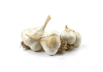 Three raw garlic isolated on white