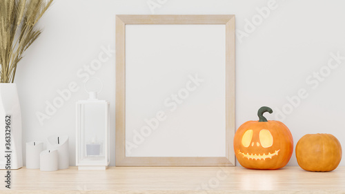 Photo frame mockup on table with halloween decoration