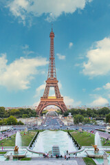 Paris, France - July 3th 2019 - Tourists visiting the Eiffel tower (Tour de Eiffel) on a sunny day