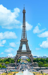 Paris, France - July 3th 2019 - Tourists visiting the Eiffel tower (Tour de Eiffel) on a sunny day