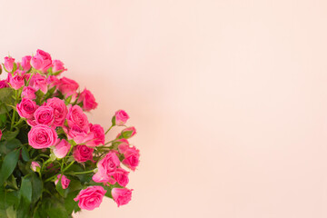 Beautiful bouquet of pink roses on light background