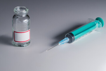 Urine sample bottle and Syringe